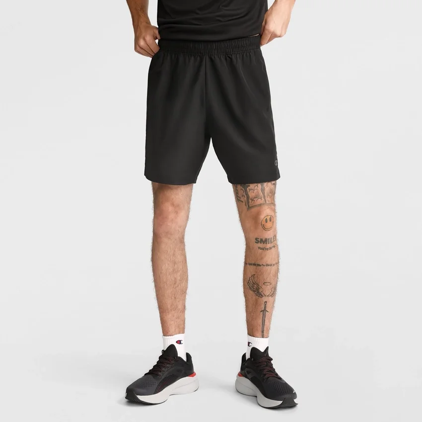 Pantaloni scurți sportivi țesuti de 7"